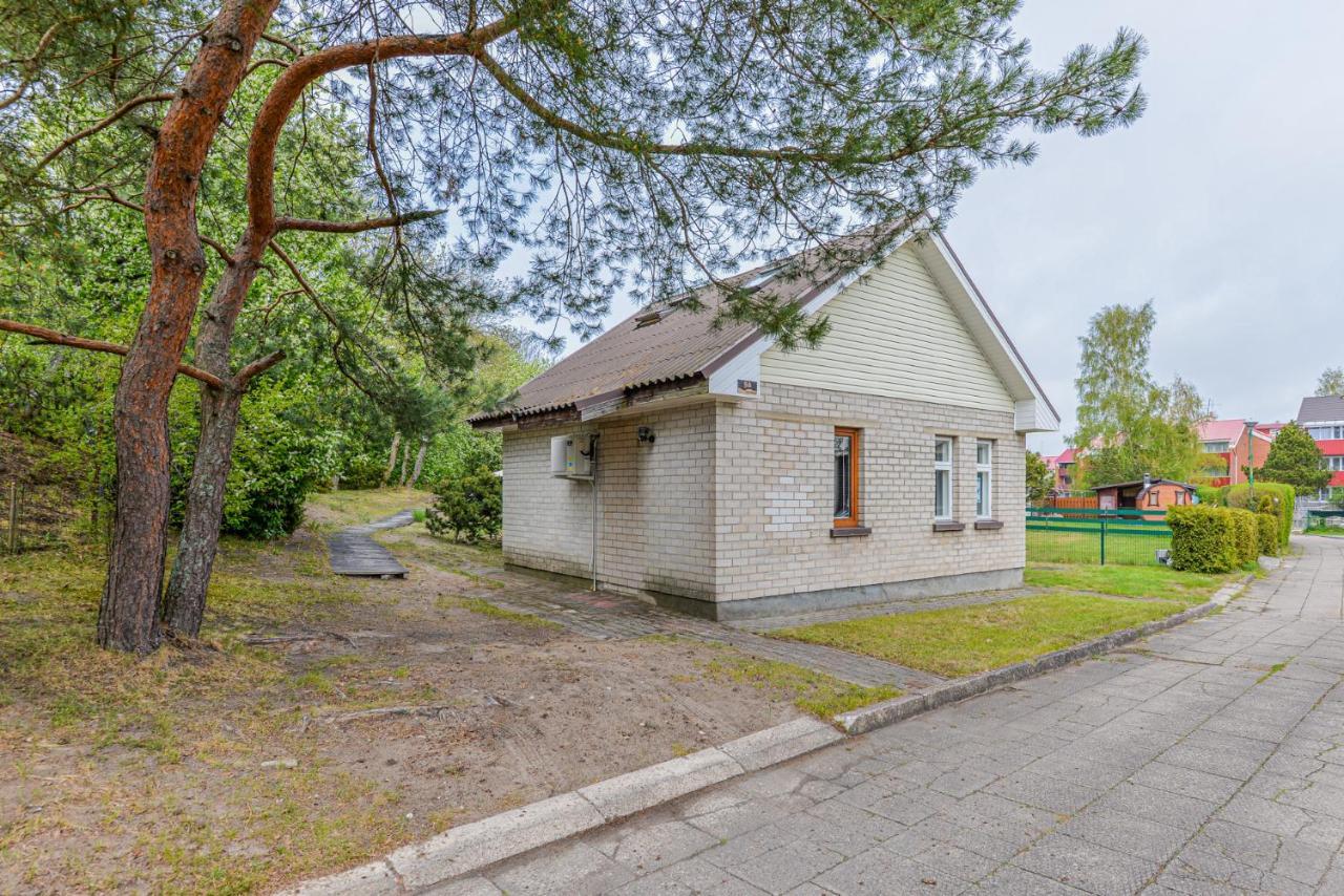 Laimingas Uodas Šventoji Buitenkant foto